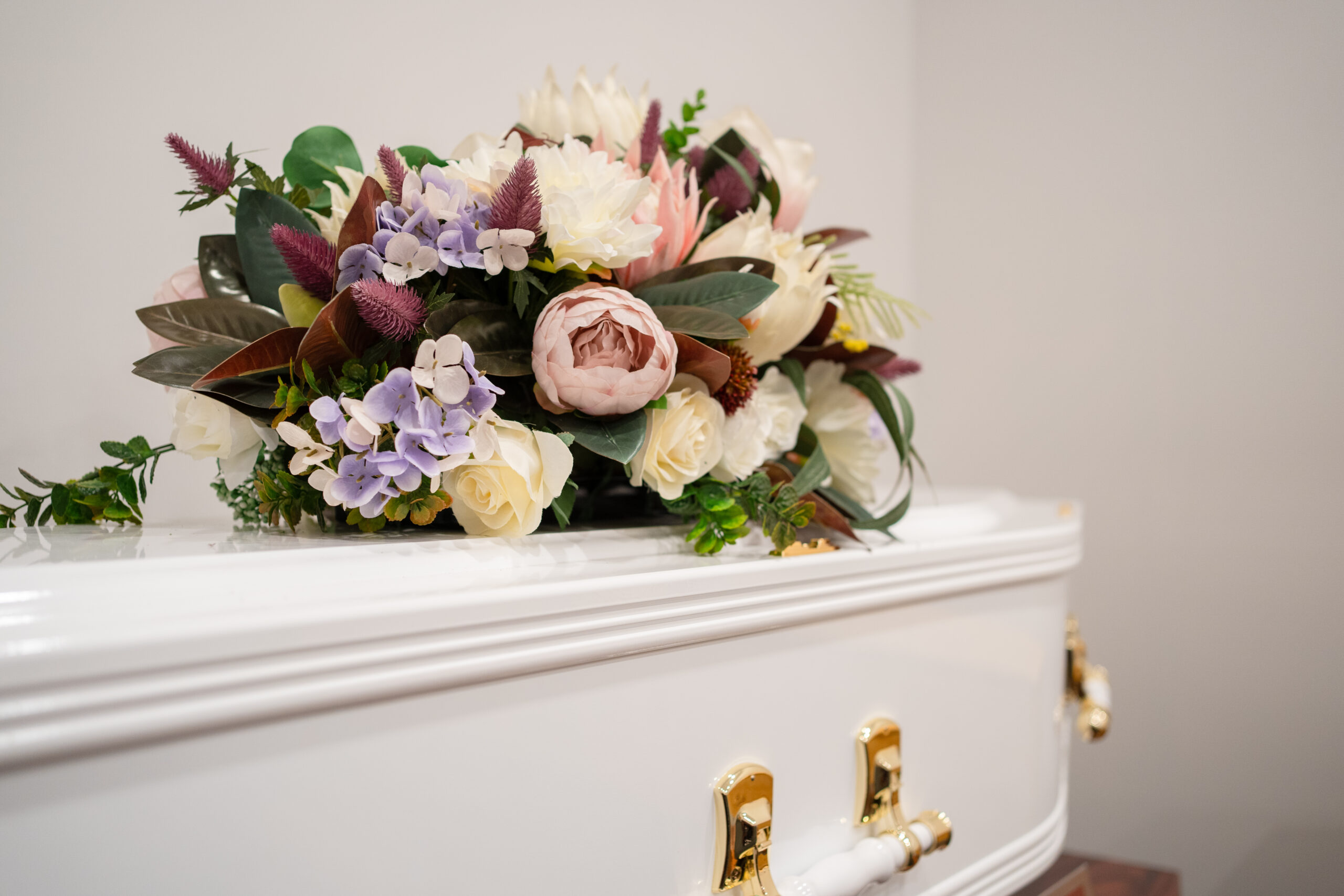 Flowers on coffin